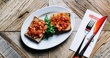 Gratis Piccola Bruschetta als Studentenrabatt zu deiner L'Osteria Bestellung